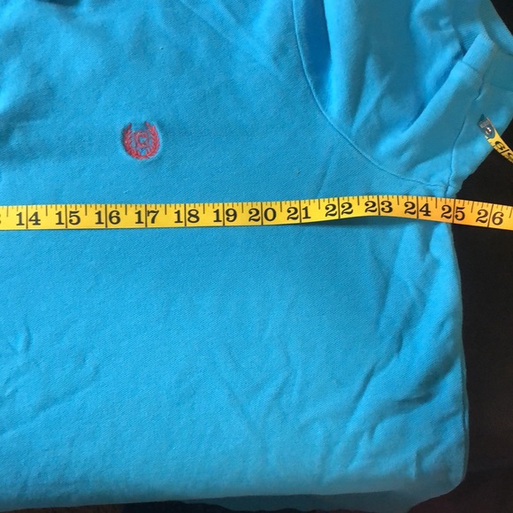 Classic fit world polo shirt in size Xl turquoise color the emblem is pink - Picture 6 of 7